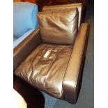 A brown leather Habitat armchair