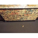 A large ebonised pine trunk with super hero comic decoupage