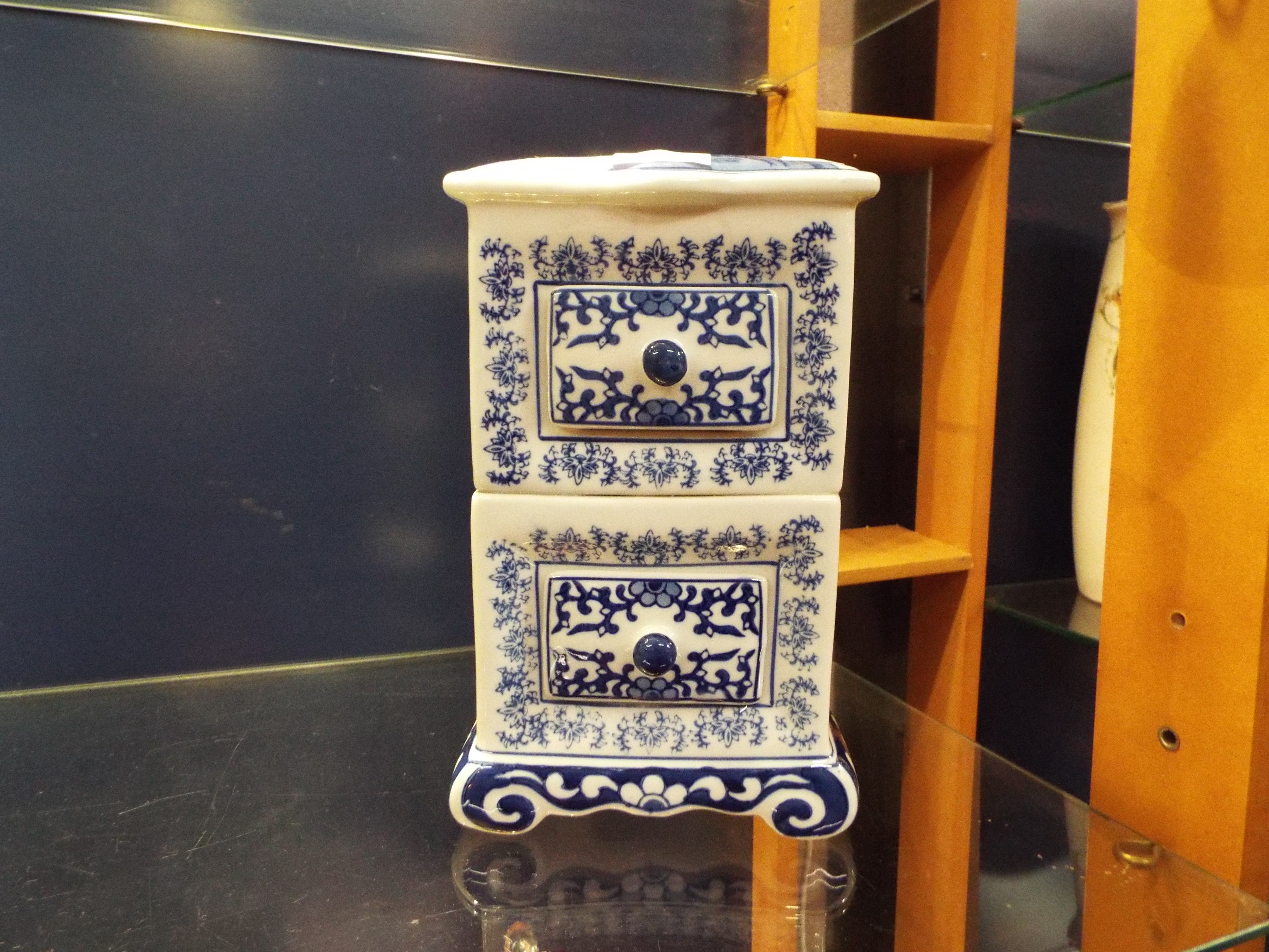 A blue & white Oriental style ceramic spice chest