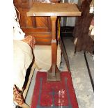 An oak Gothic style former church lectern