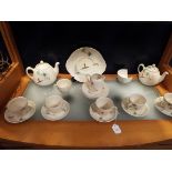 A Royal Doulton 'The Coppice' part tea-set comprising of tea and coffee pot, sandwich plate,
