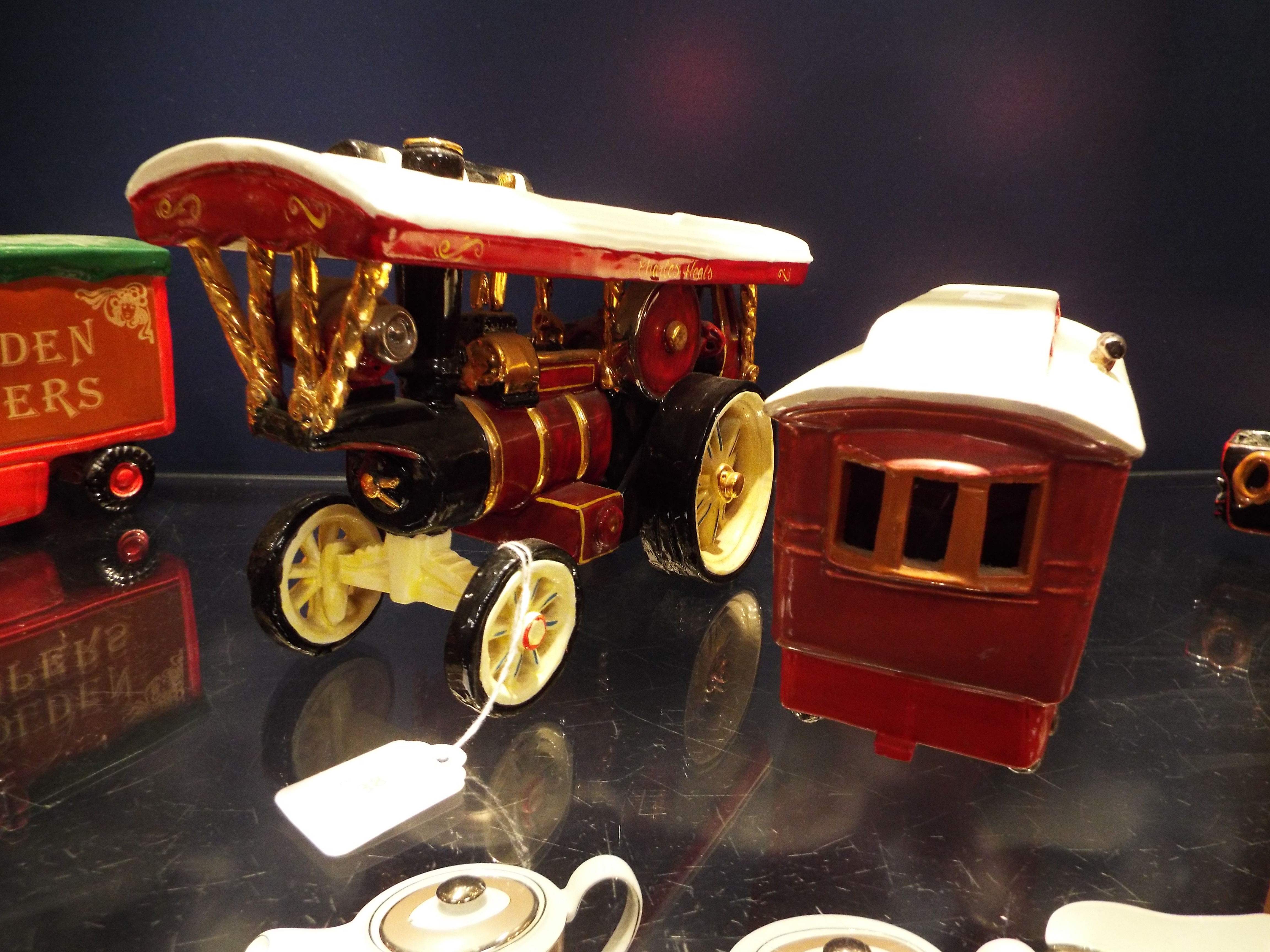 A late 20thC handmade model of a traction engine 'The Charles Heals' together with a matching
