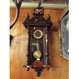 An early 20thC mahogany cased wall clock,