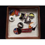 Eleven motorcycle lapel badges