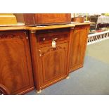 A 20thC Italian lacquered break-front side cabinet fitted with central drawer and cupboard flanked