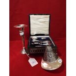 A silver manicure set dated 1913,