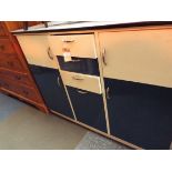 A 1950's - 60's blue Formica topped kitchen table and two matching chairs and similar cabinet with