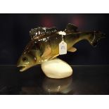 A Royal Dux porcelain figurine of a fish,