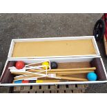 A vintage croquet set in original case