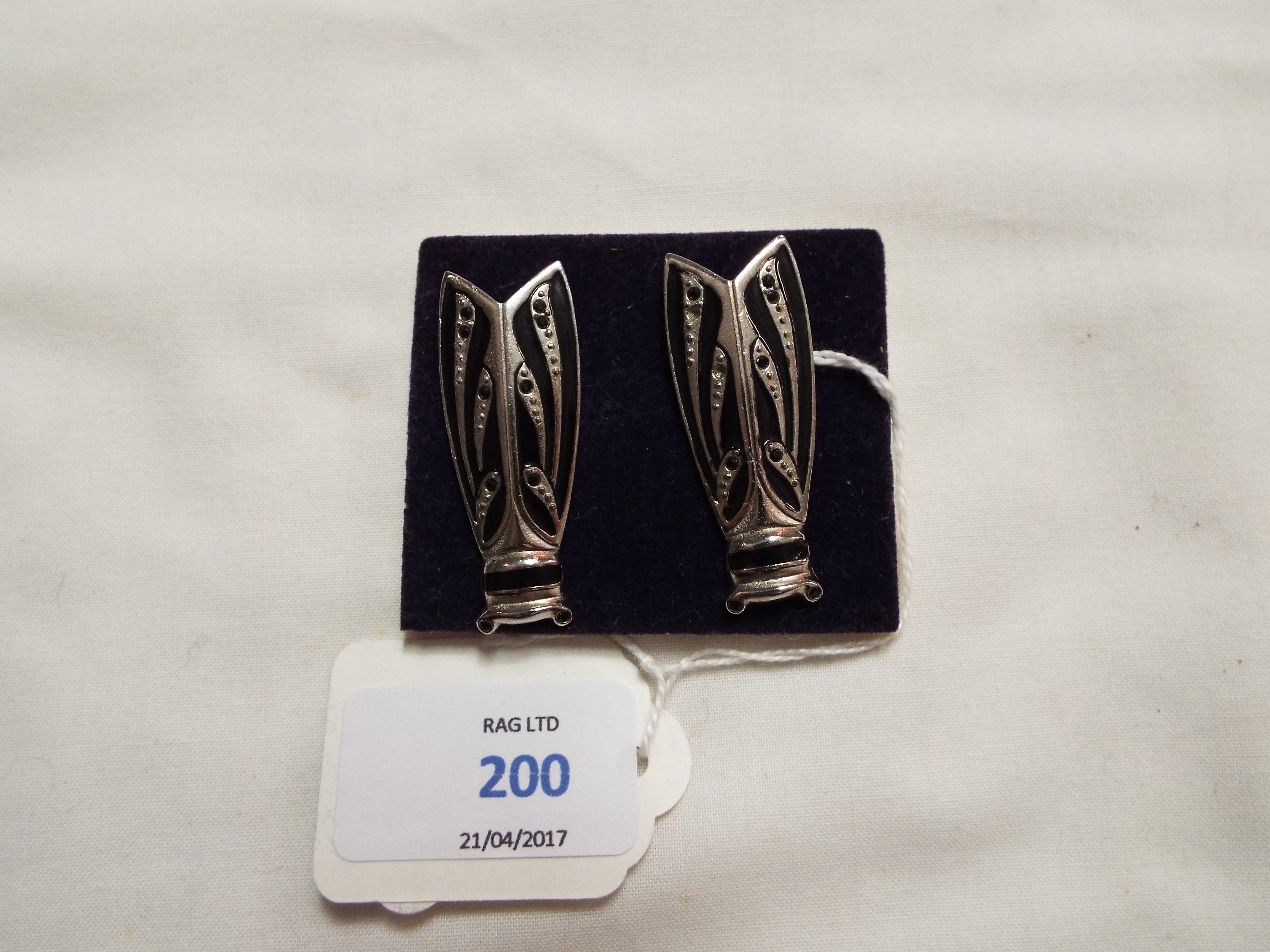 A pair of Butler & Wilson white metal and black painted earrings in the form of bees
