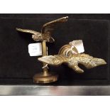 Two early 20thC brass car mascots in the form of eagles,