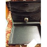 An early 20thC writing case with fitted interior and inkwell
