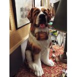 A large ceramic fireside St Bernard dog