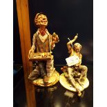 Two Capodimonte figurines of a 'Cobbler' and a 'Street Trader',