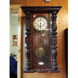 A late 19thC mahogany cased Vienna wall clock