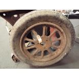 A vintage ten spoke trolley bus wheel