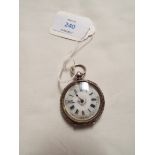 A Victorian ladies ornately engraved silver pocket watch,