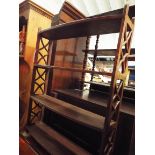 A set of mahogany bookshelves with openwork sides