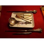 A good quality silver plated apostle spoon, two silver handled button hooks,