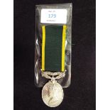 A George VI Territorial Efficiency medal to 6401127 Pte. W.H. James, R.
