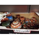 A selection of terracotta glazed pottery