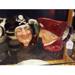 A Royal Doulton Toby jug 'Cardinal' Rd no 809558 and a Royal Doulton Toby jug 'Long John Silver' D.