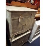 A pair of painted faux marble side cabinets