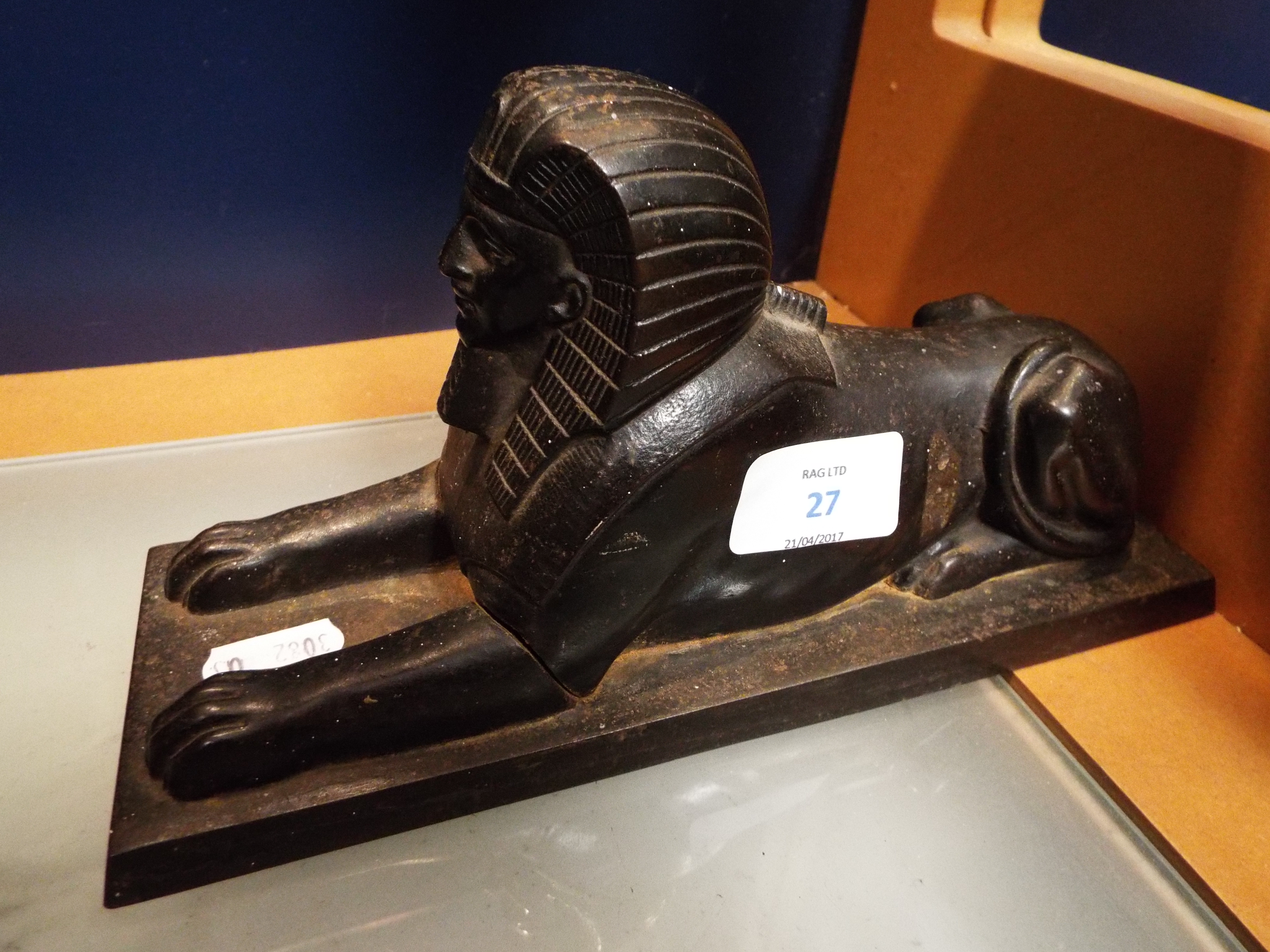 A doorstop in the form of a sphinx