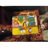 A child's tin plate carry case with assorted playing cards,