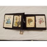 An Edwardian album containing a selection of pictorial greetings cards