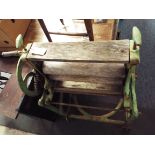 A Victorian green painted cast metal mangle in working order