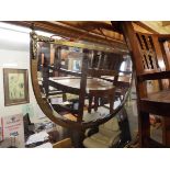 A Victorian brass wall mirror with applied acanthus decoration and bevel edged plate