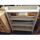A grey painted waterfall bookcase