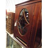 An Edwardian walnut chequer strung and lined inlaid display cabinet with astragal glazed door