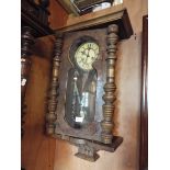A walnut cased wall clock for restoration
