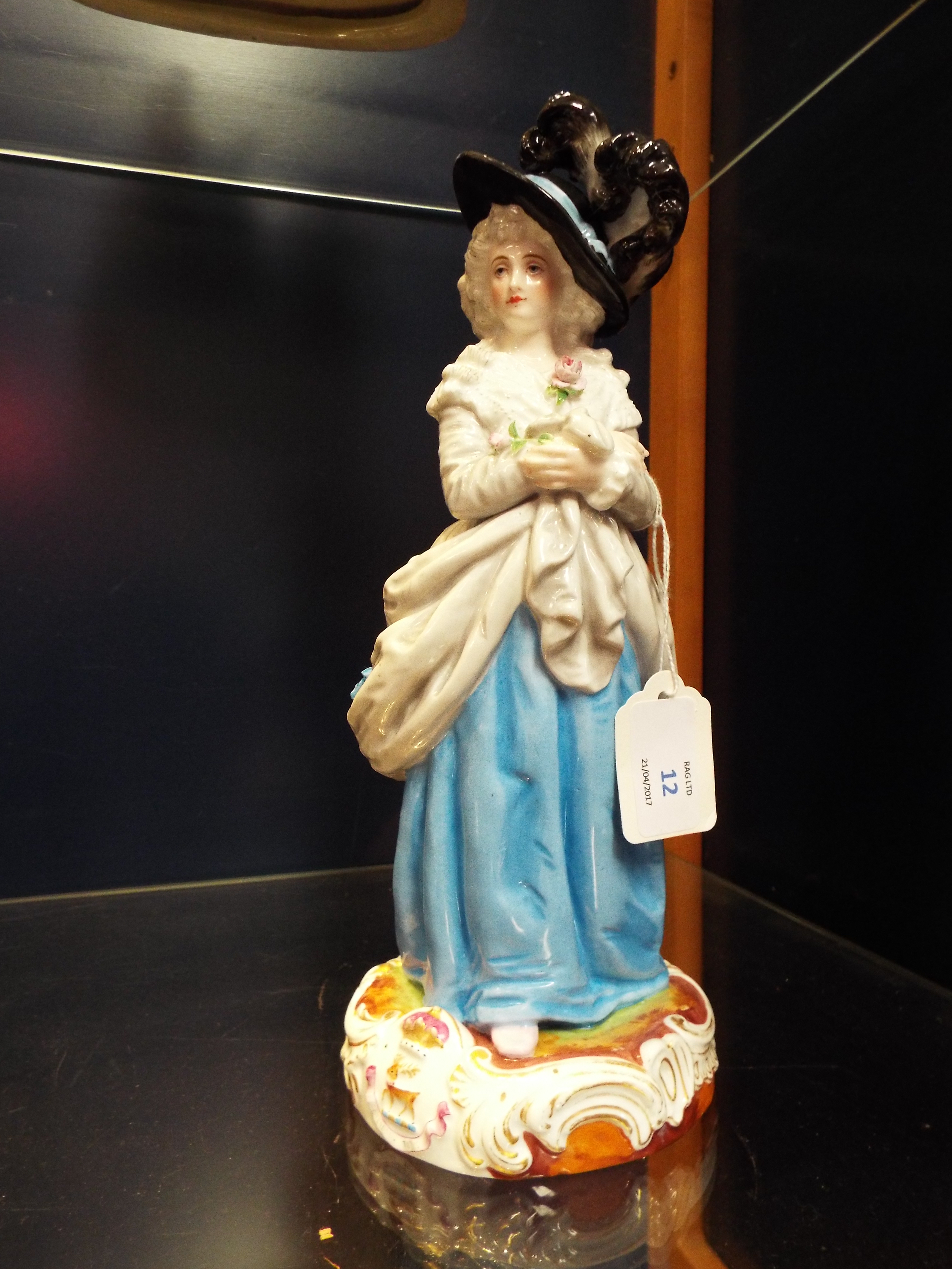 A French Charenton-Saint-Maurice porcelain figurine of female in classical dress