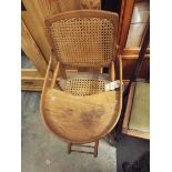 An antique childs metamorphic high chair