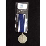 An Elizabeth II Police Long Service & Good Conduct (Exemplary) medal to Inspector Walter C Tachon