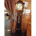 A 20thC mahogany long case Fen clock the silvered chapter ring with Roman numeral and inscribed