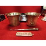 Two silver stirrup cups,