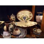 A selection of Torquay motto ware to include platter, shallow bowl, coffee pot,