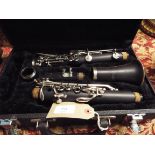 A cased Buescher Bu-2 clarinet