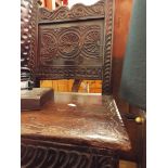 A late 18thC/early 19thC oak childs chair with ornate carving