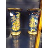 A pair of Carlton ware vases with the new pagoda decoration 10" high