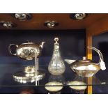 A good quality Art Deco style silver plated teapot together with a spirit kettle and decanter of