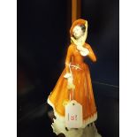 A Royal Doulton figurine;