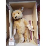 A boxed Steiff limited edition collectors club 'Baby Bear' No 5250 with golden mohair,