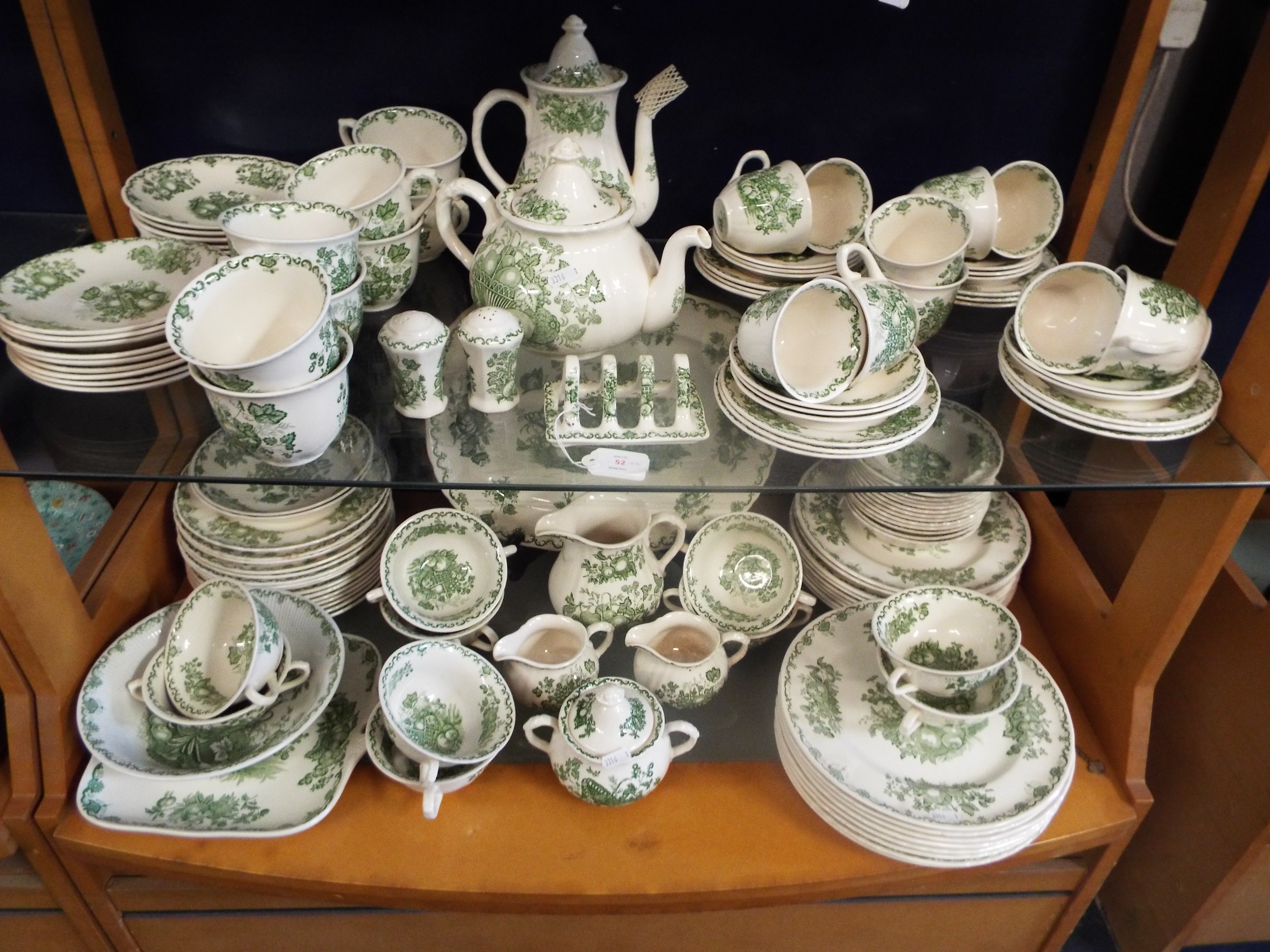 A quantity of Mason's 'Fruit Basket' patterned green dinner-ware to include cups, saucers,