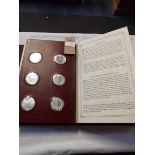 An album containing silver proof 'The Churchill Centenary Medals' created by John Pinches and