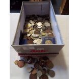 A large selection of assorted coinage to include six pence pieces, half crowns, one pennies,